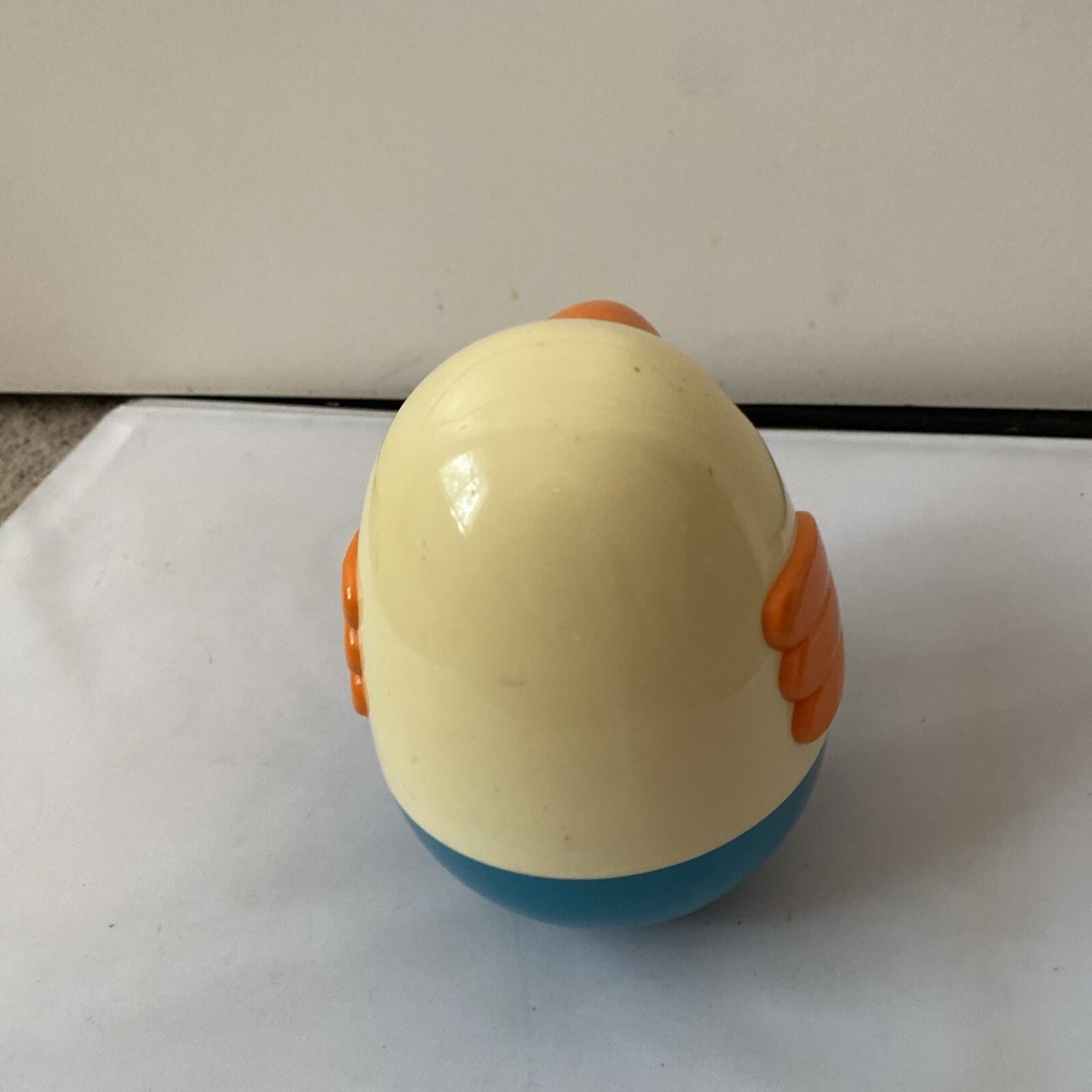 Vintage Musical Roly Poly Penguin pull behind toy