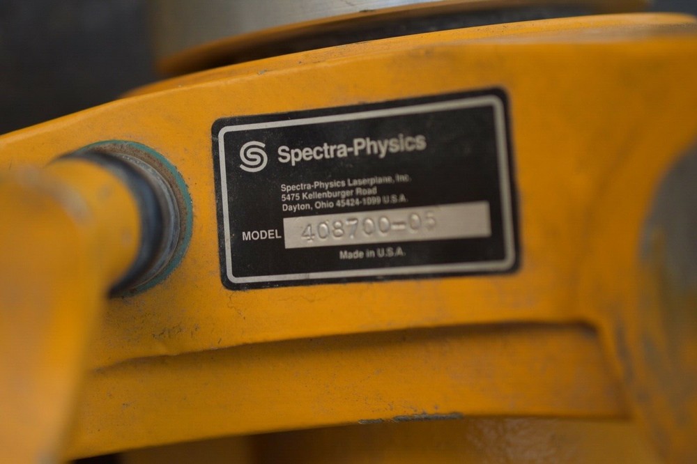 Laser alignment beacon land contouring system