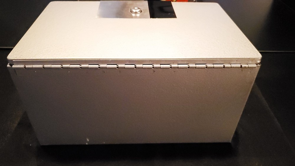 The Protector Fire Safe Grey and Silver New with Key