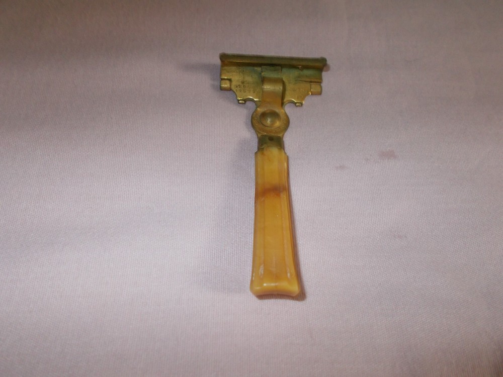 Vintage Schick Razor With Bake Lite Handle Metal Brass
