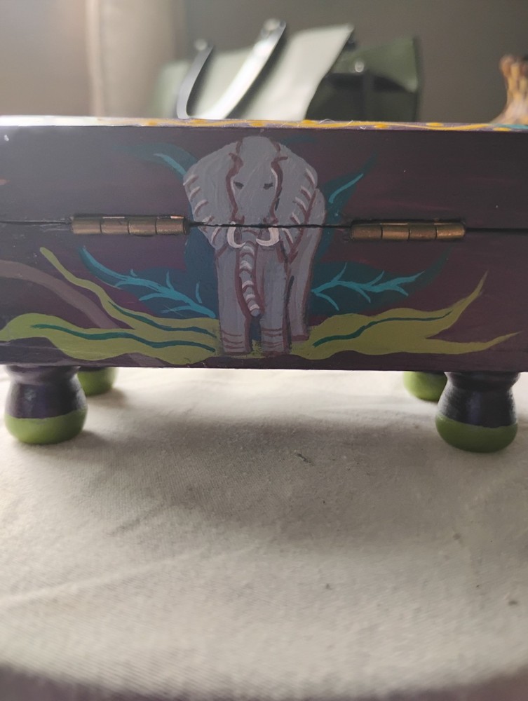 small painted box with tiger, elephant, zebra, lion, monkey