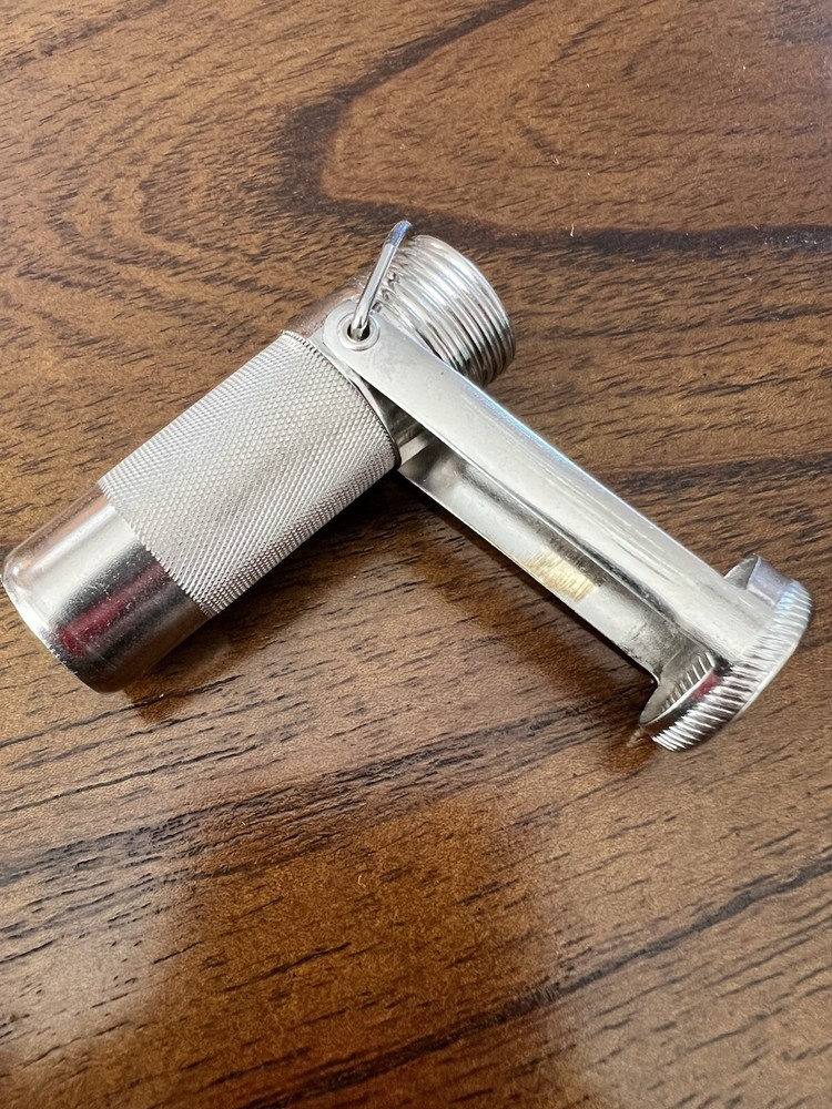 VINTAGE MADE IN HONG KONG CHROME MATCH SAFE CONTAINER.