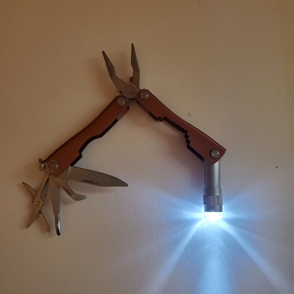 8 Function Scout Tool includes LED Light By Eddie Bauer Copper