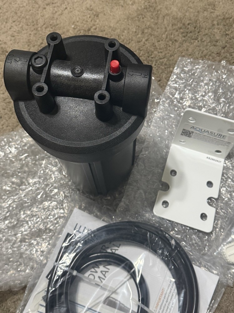 AQUASURE REPLACMENT FILTER CANSITER AND MOUNTING BRACKET AND HOSE TOOLS ETC.