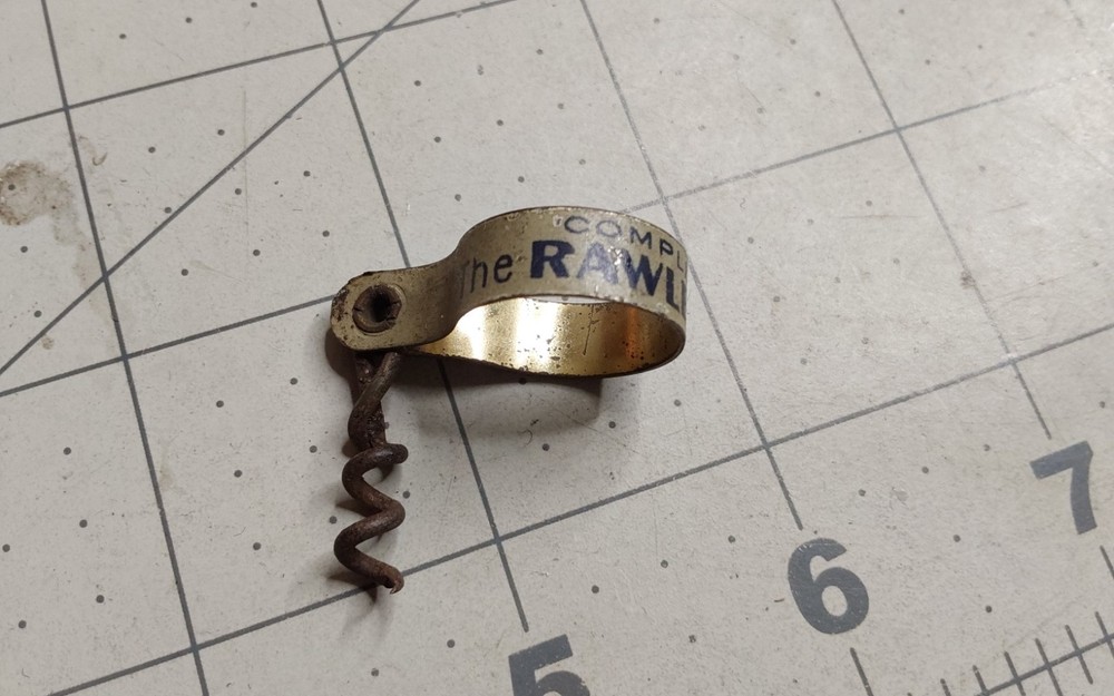 THE RAWLEIGH MAN FINGER PULL CORKSCREW FOLDING