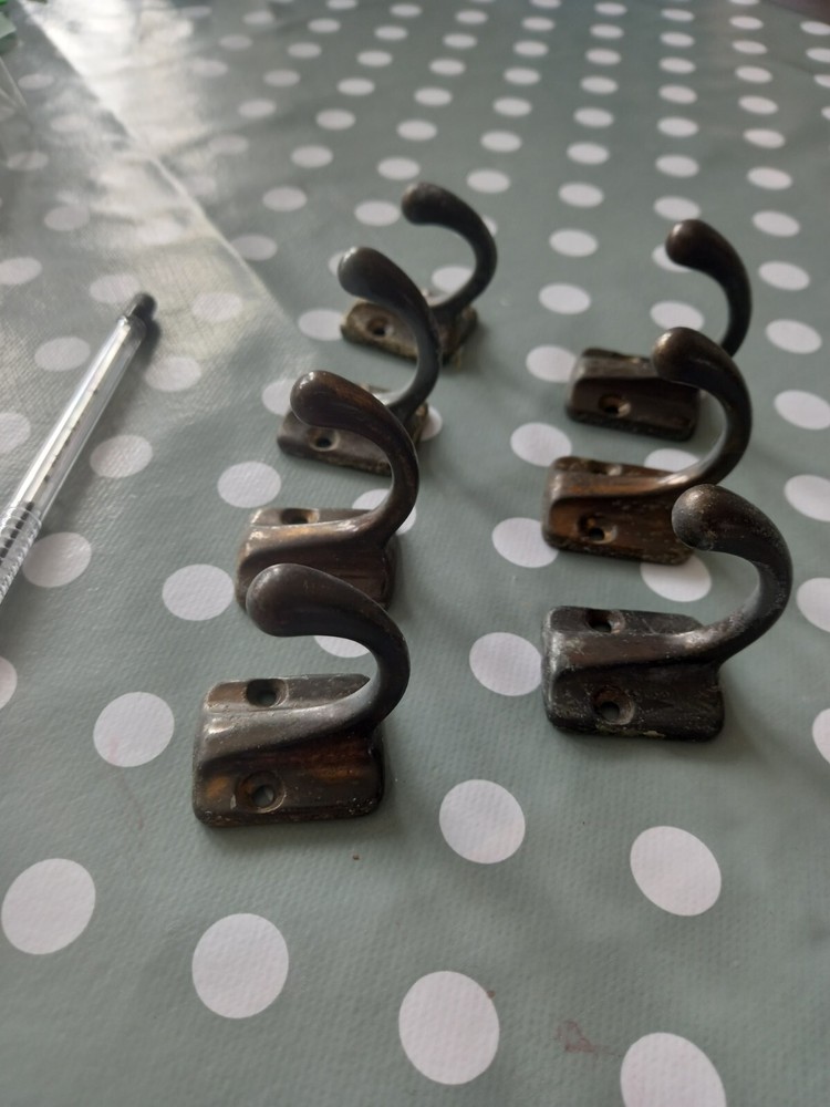 Reclaimed brass coat hooks
