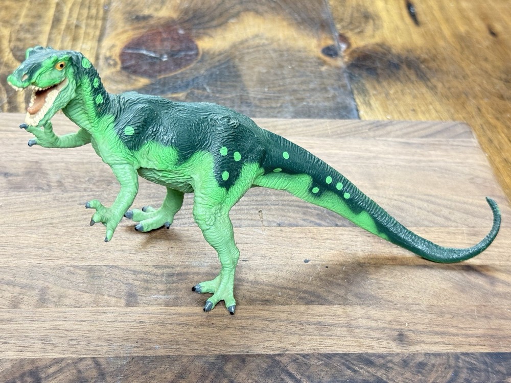 Carnegie Collection dinosaur models original and revised Allosaurus