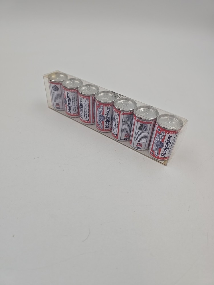 7 Miniture Budweiser cans