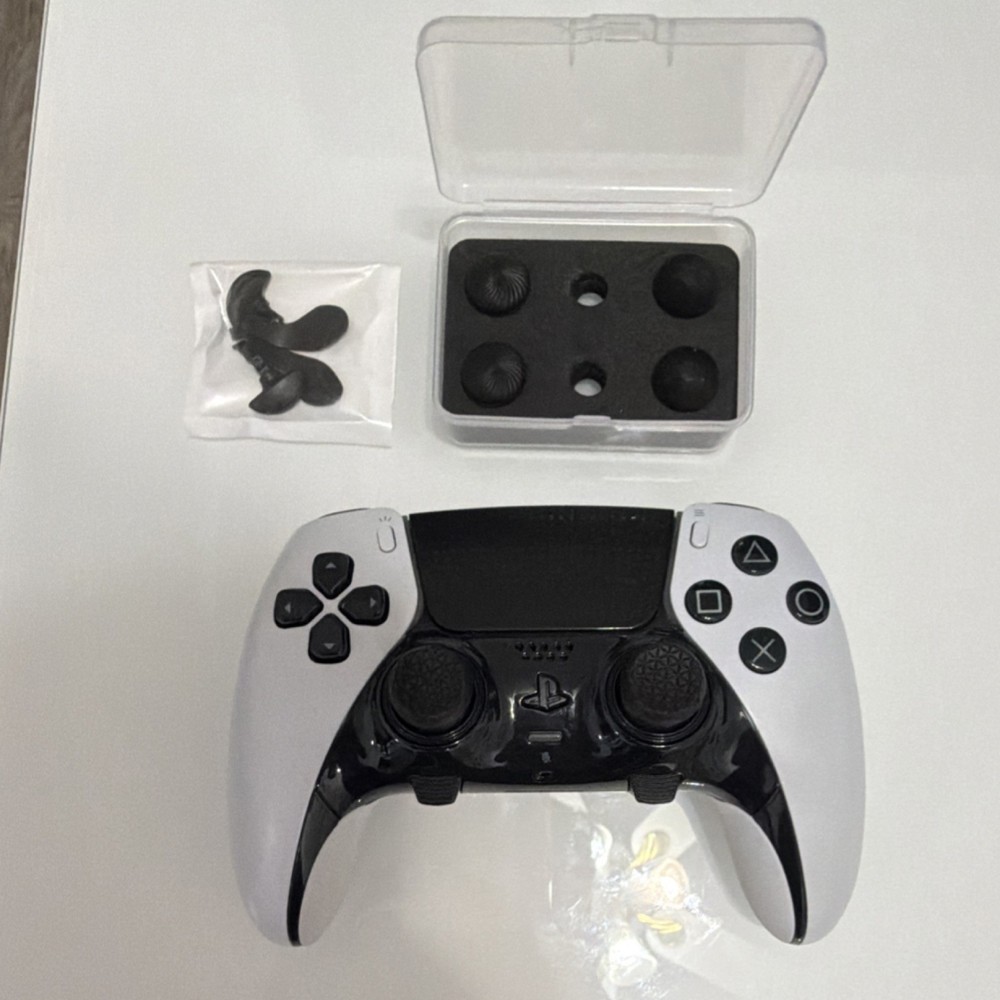 Sony DualSense Wireless Controller Bundle with Thumb Grips, Trigger Attachments…