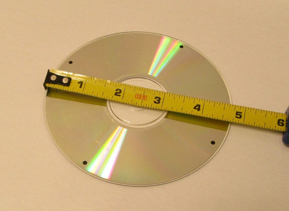 C D Clock Disc with Instructions ( Personal Service Manufacturing Co.)