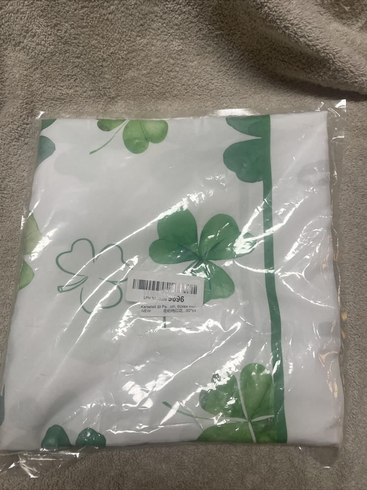 New In Pack St. Patrick Shamrock Table Cloth Measures 60” By 84”