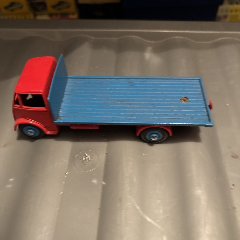 DINKY GUY FLATBED 1950s.red & light blue .