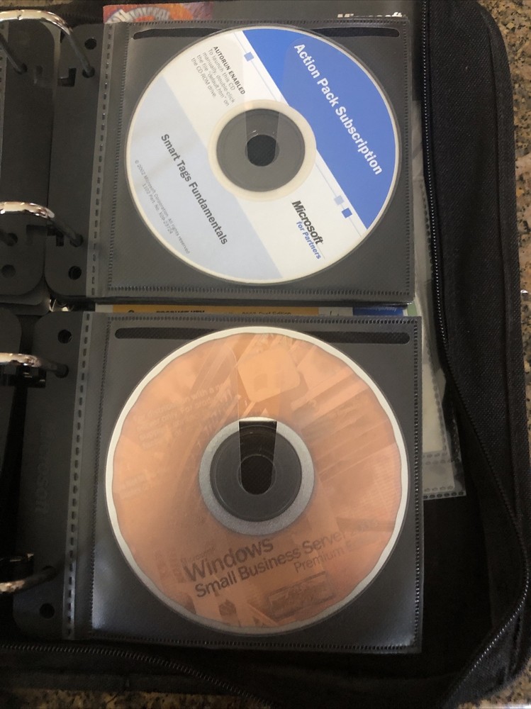 Microsoft Action Pack-Asst. Software 48 CDs- Many Keys Included