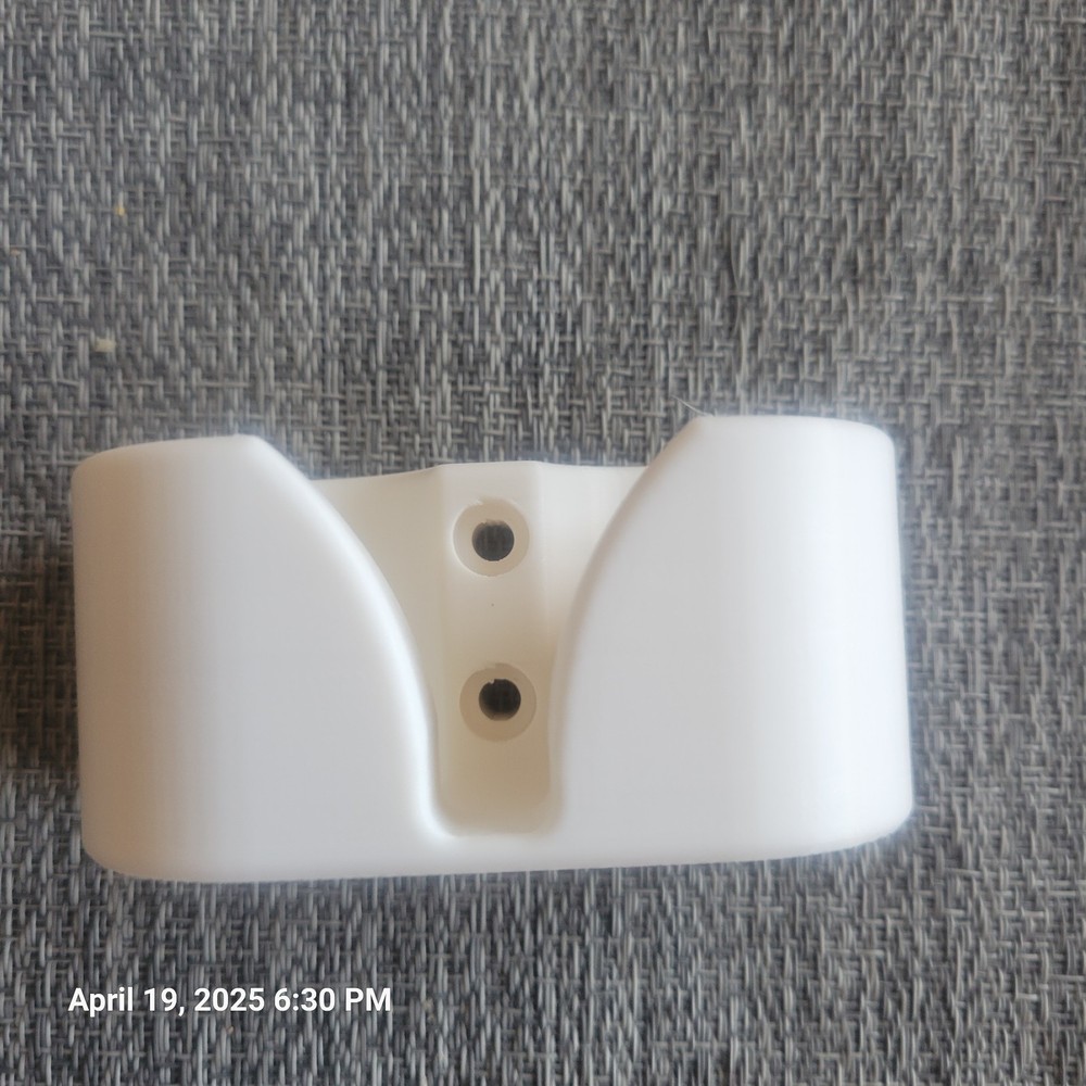 Scupper plug holder