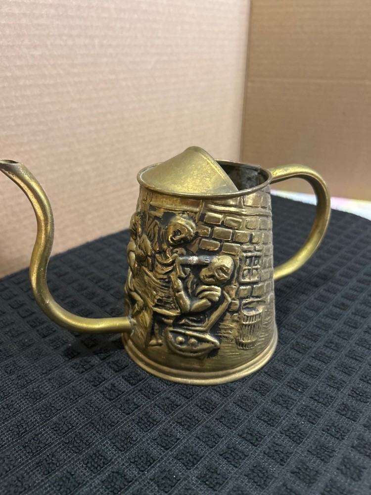 brass vintage watering can