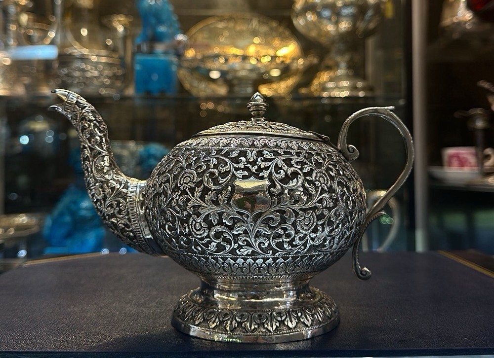 Kutch Indian silver Teapot With Scroll And Rosette Embossing. Circa 1900.