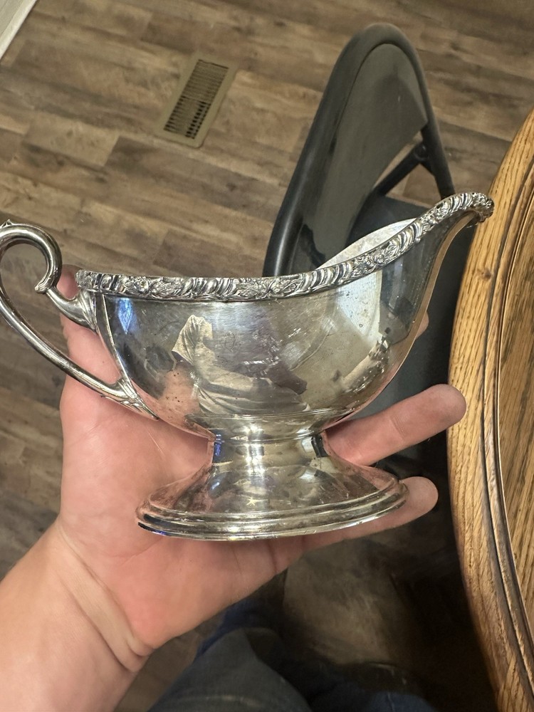 Set Of Four Silver Plated Cups.
