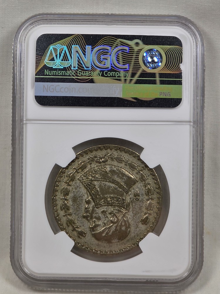 1961 Mo Mexico Silver Un Peso, NGC Genuine.