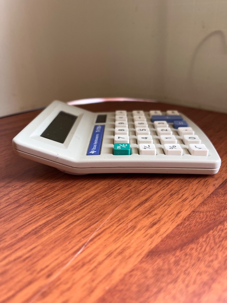 TEXAS INSTRUMENTS TI-1795+ Handheld Calculator Solar Powered