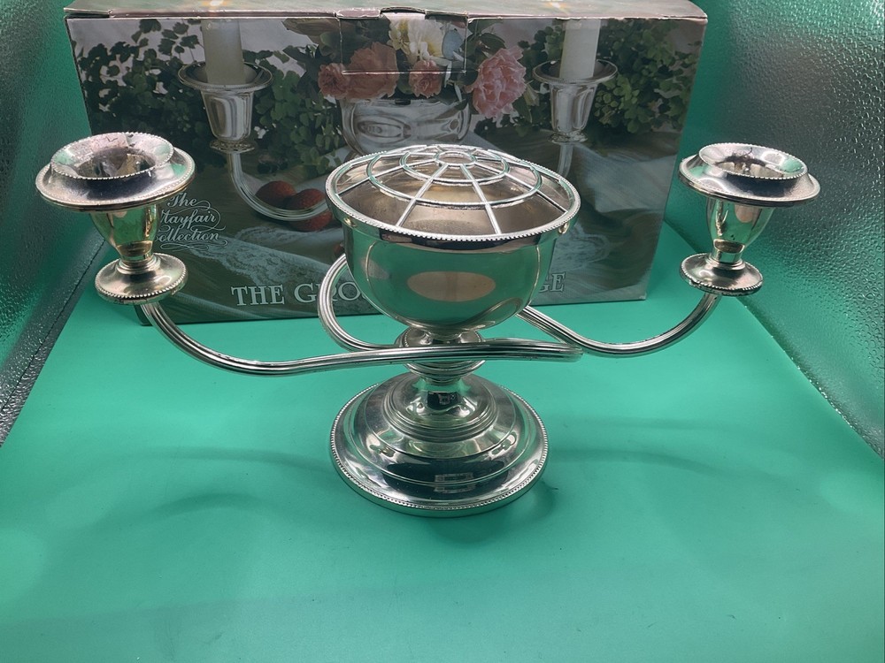 Good silver plated three armed Candelabra, made in England.