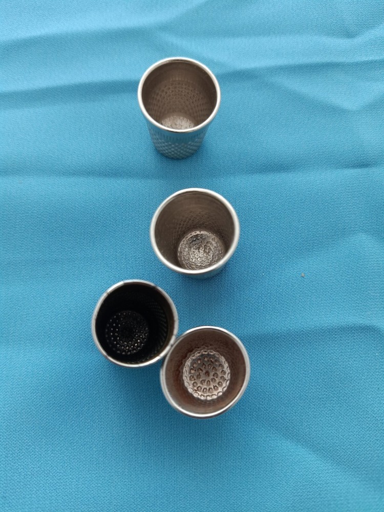 lot of 4 vintage sewing thimbles differences sizes