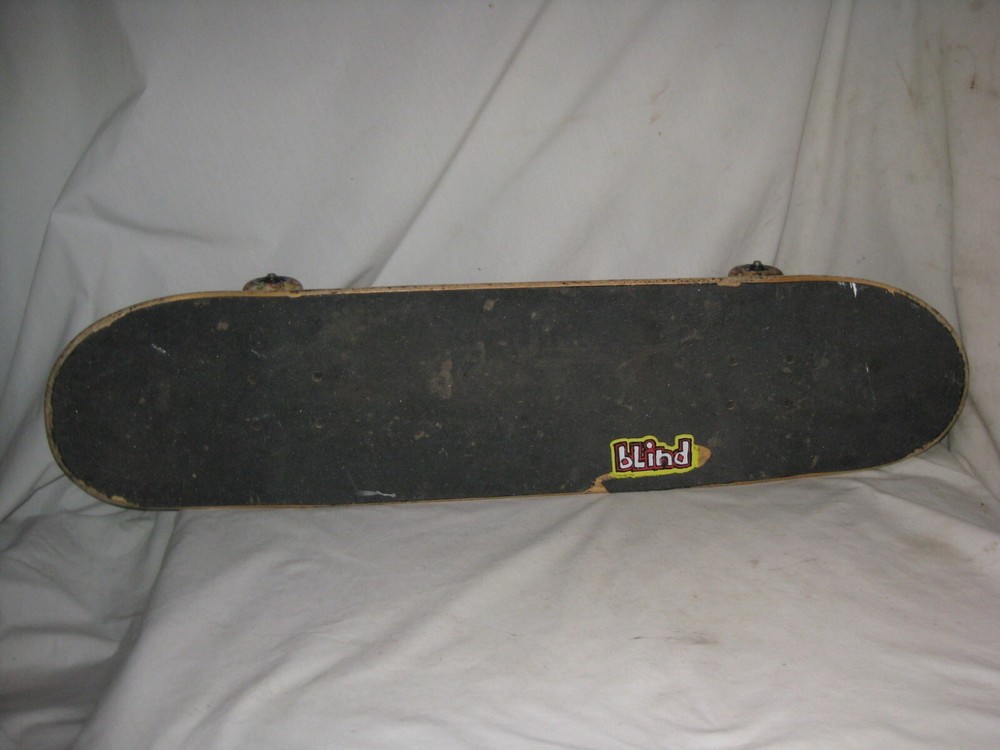 pre-owned skateboard Tensor trucks Psychedelic wheels Blind grim reaper deck