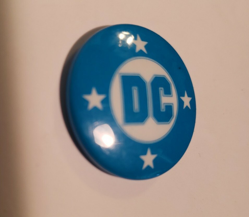 DC Comics promo pinback pin vintage blue and white