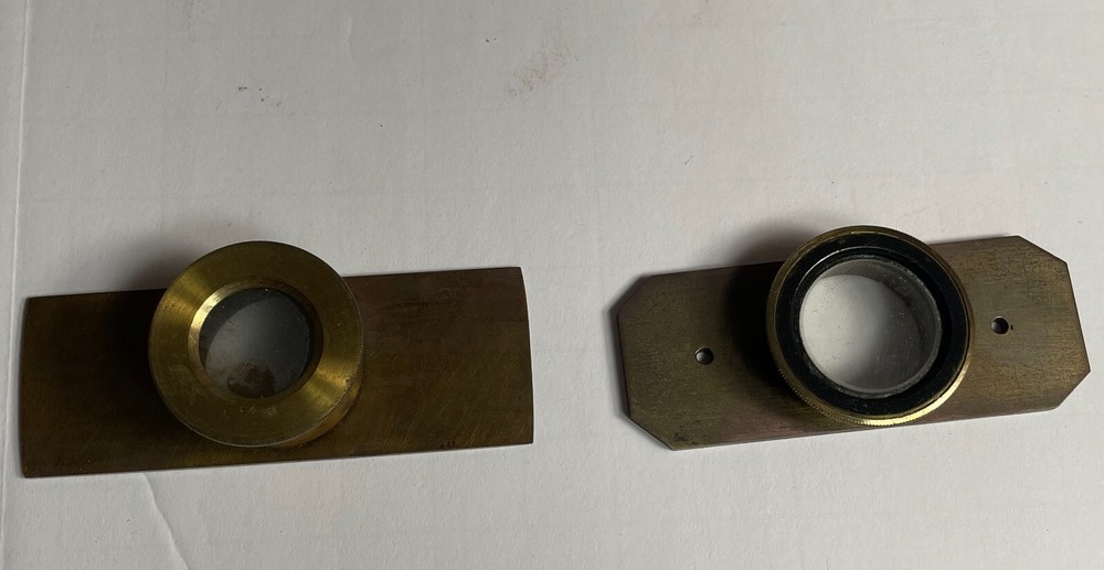 Antique Signed J.H. Steward microscope with case and some accessories.