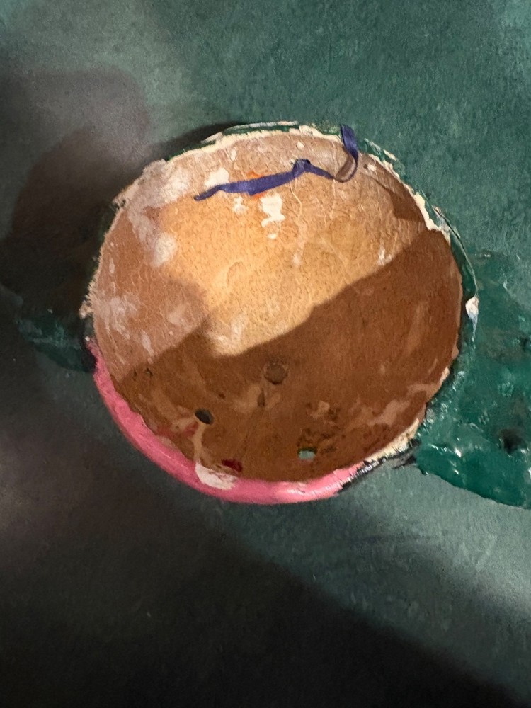 2 primitive string holders. Looks to be handmade.