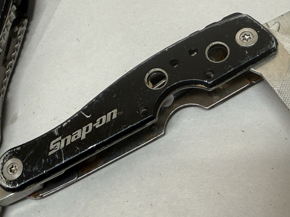 Snap-On Multi-Tool Knife Screwdriver File Saw Pliers