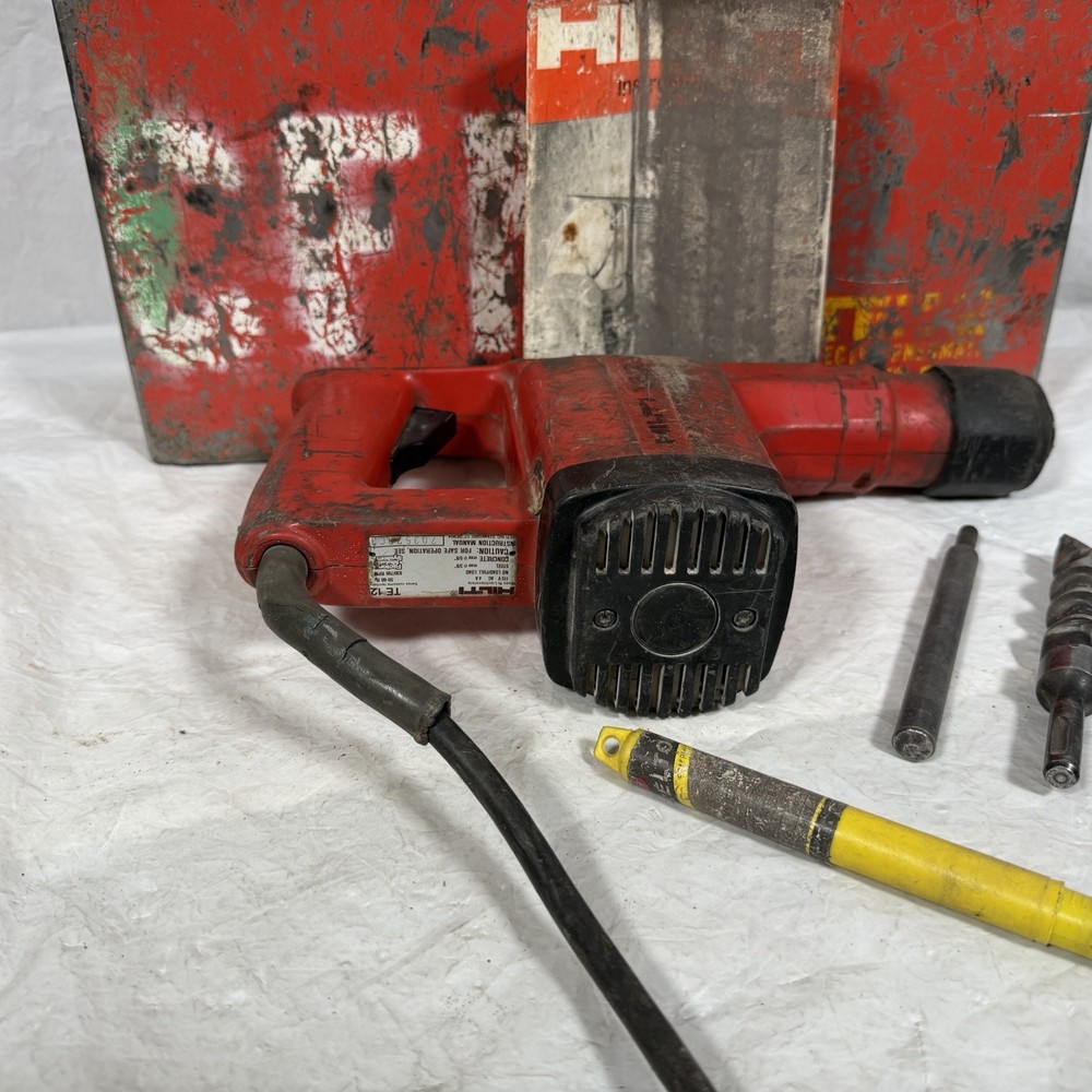 HILTI HAMMER DRILL MODEL TE 12 W/ HARD CARRYING CASE AND DRILL BITS Working