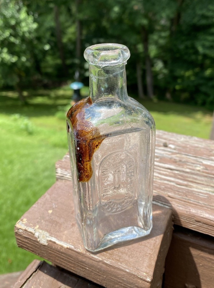 The Singer Sewing Machine Co Bottle