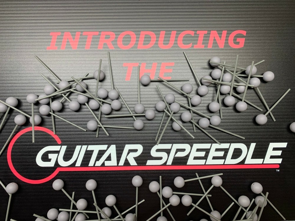 Guitar Speedle String tool for stinging electric through strings bridge body