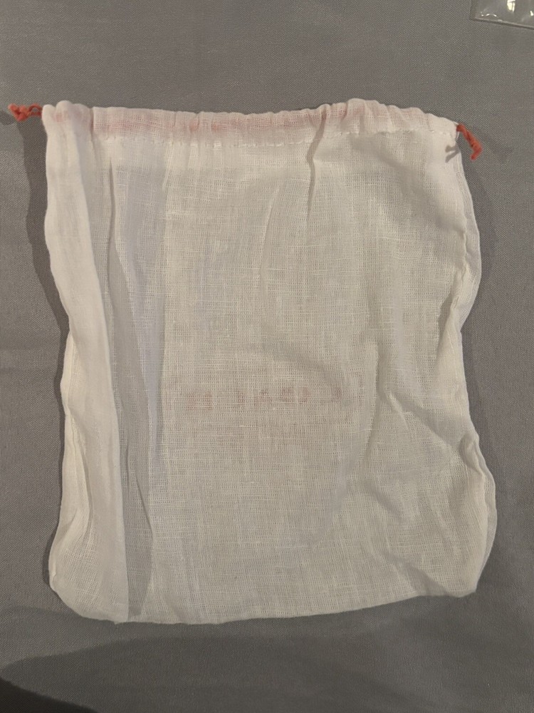 Coach small white dust bag 6x7”