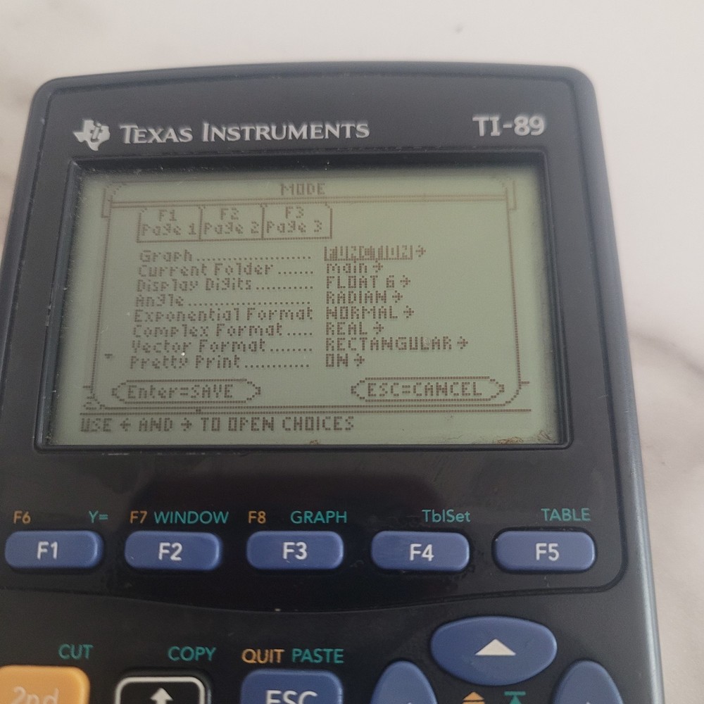 Texas Instruments TI-89 Calculator, powers on, Unknown if fully functional
