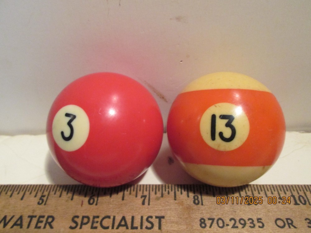 TWO [2] SPARE BILLARD BALLS.