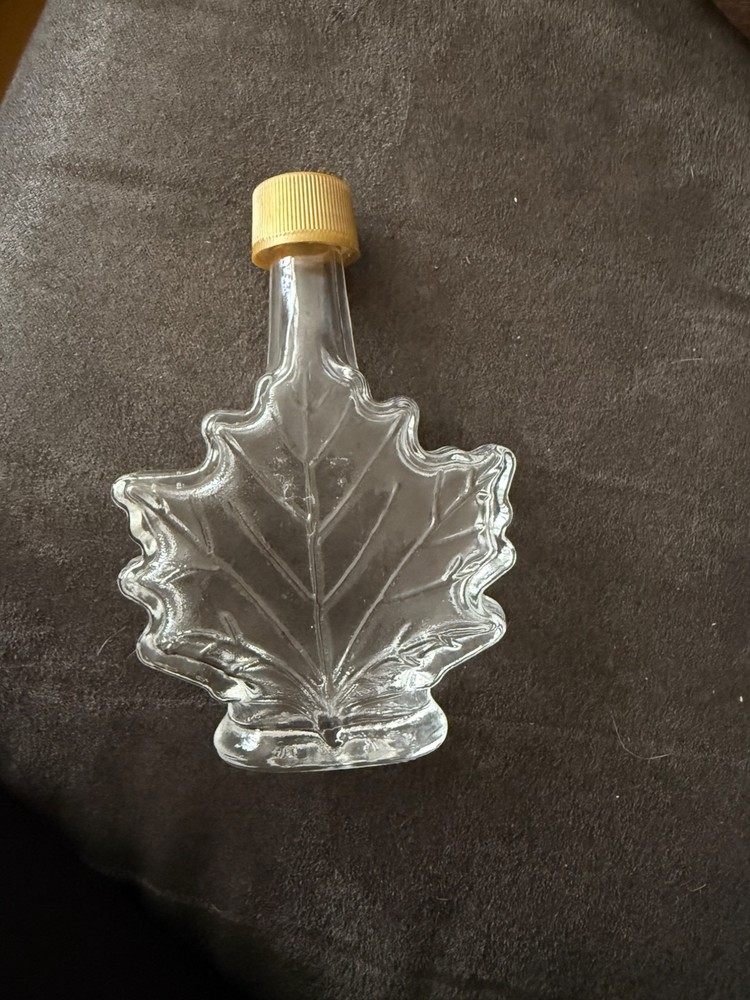 Maple Leaf-Shaped Clear Glass Bottle