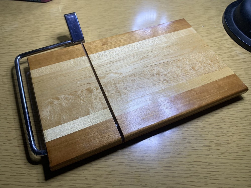 Hand Crafted Cheese Slicing Board by Norm J. Rettler. Made in 2012