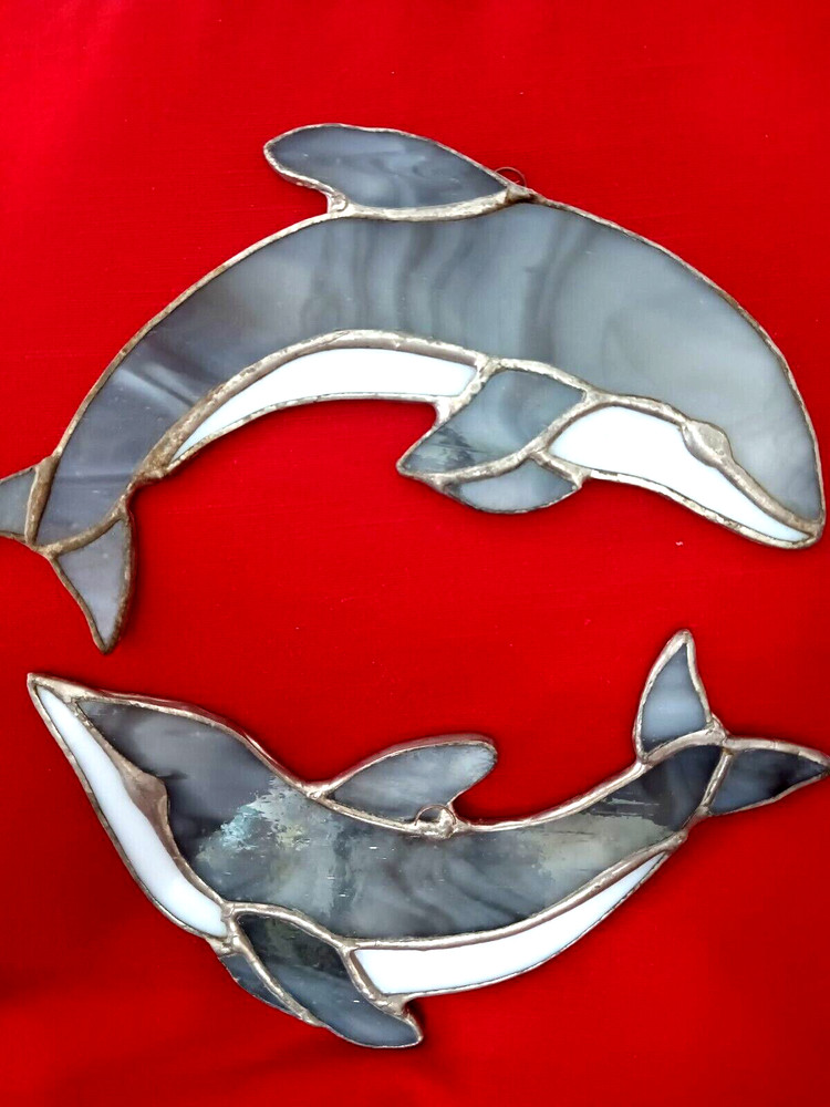 Two dolphins stained glass suncatchers