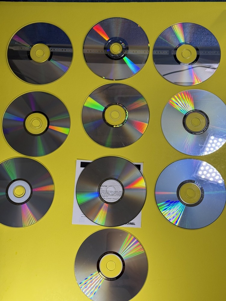 10 Vintage CD Rom Softwares Windows XP , Windows 7 , Acronis , Driver discs.