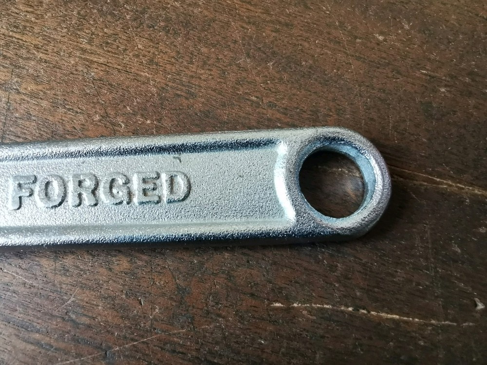 Modern 10" Adjustable Spanner to clear, no makers name.