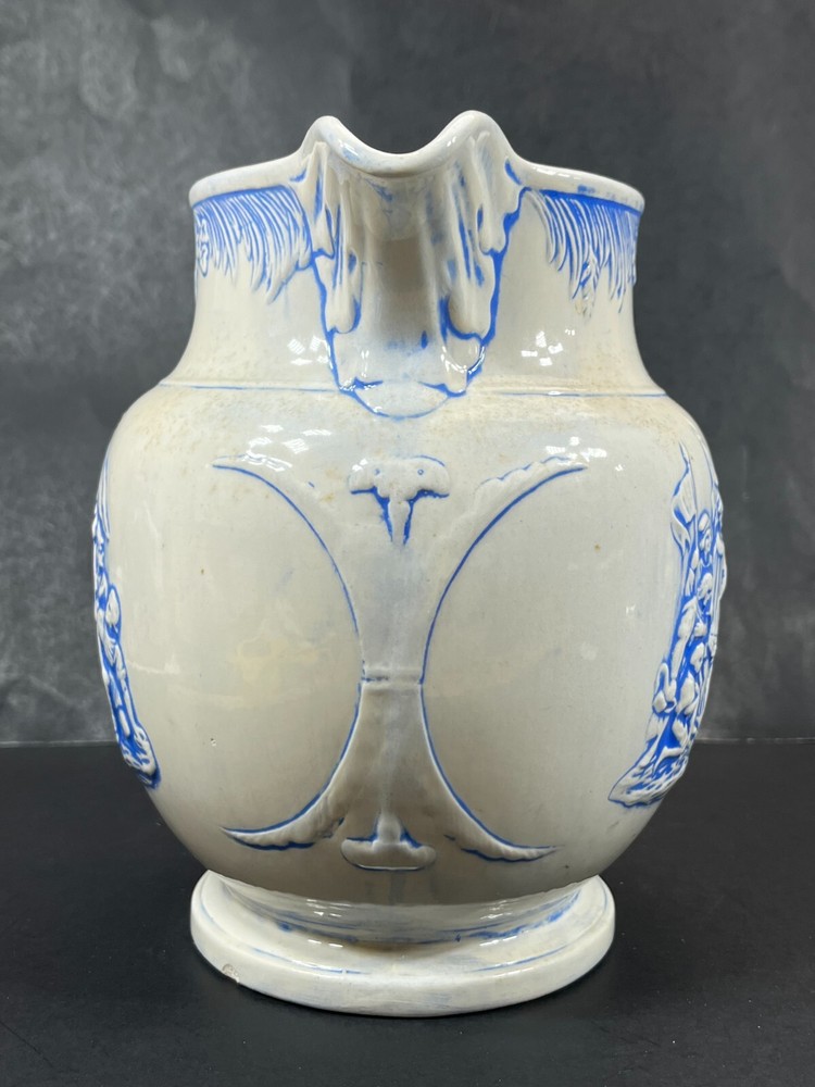 Christopher Colombus Studio Barna's Pottery Pitcher Blue White Relief Scene