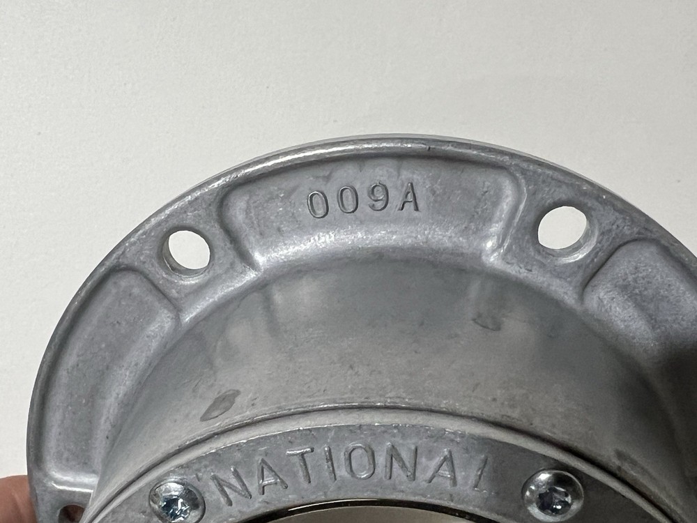 National Axle hubcap #009A-Grease Pack Style