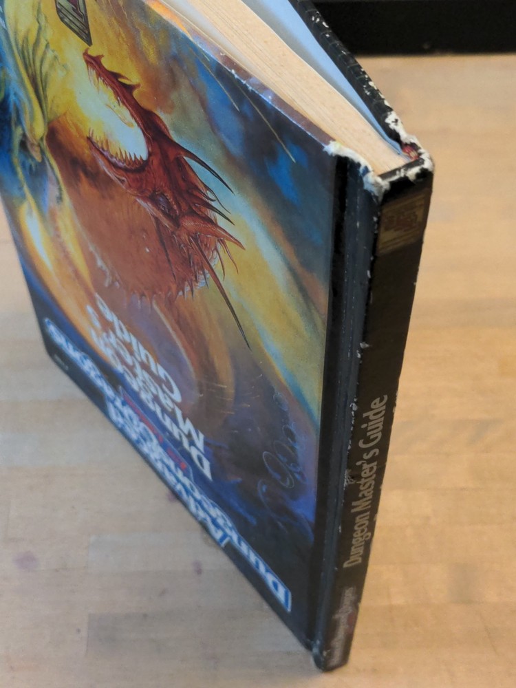 AD&D 2nd Ed Dungeon Master's Guide (3rd) Fair Condition. *Read Descript. Was Wet