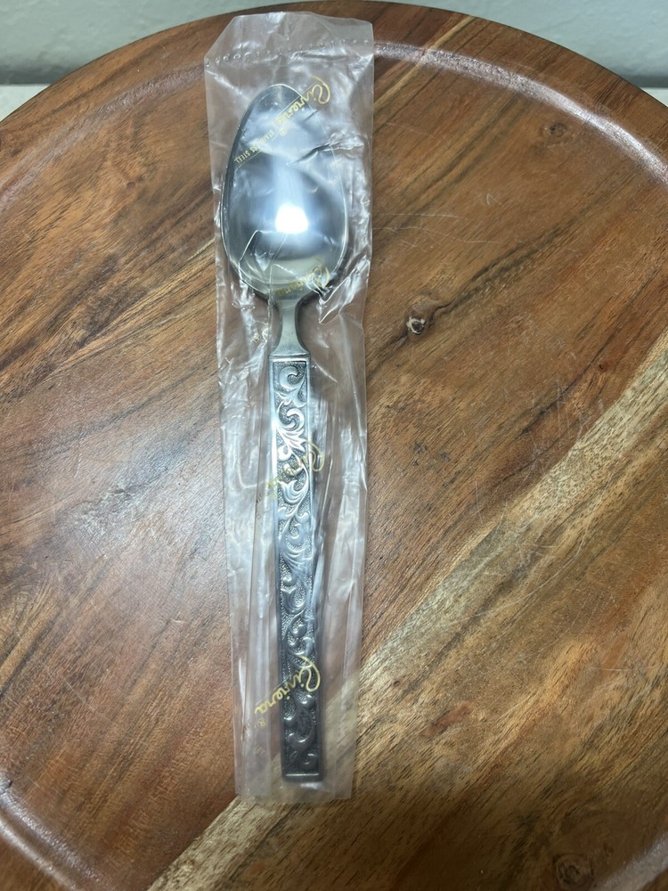 The spoon measures approximately 7 1/2" long.