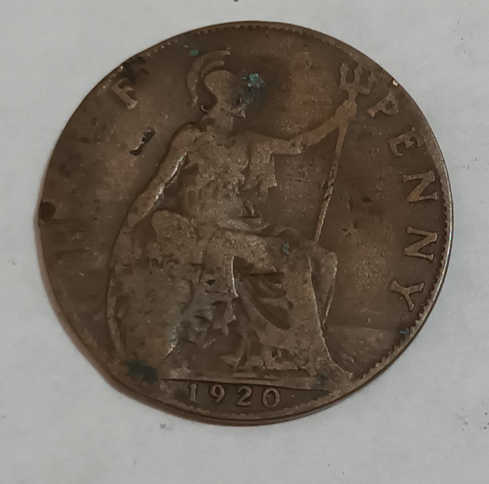 George V and George VI coins with error