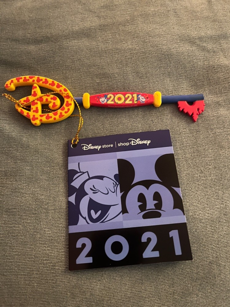 Disney store opening ceremony key 2021.