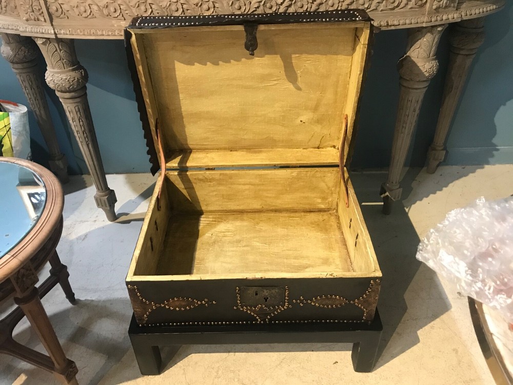 antique trunks chests on a custom stand