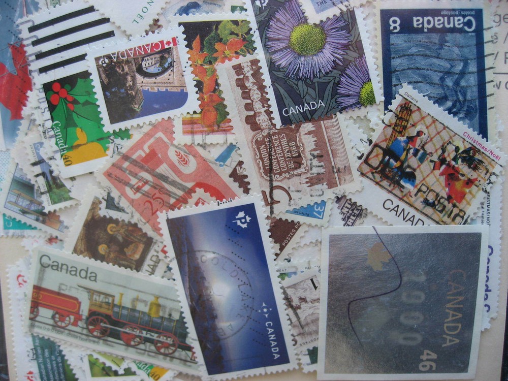 Canada colossal mixture (duplicates,mixed cond) 2000 old,new,35%comems,65%defins