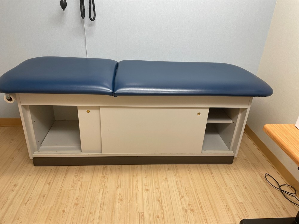 Cabinet Style Treatment Table with Sliding Doors
